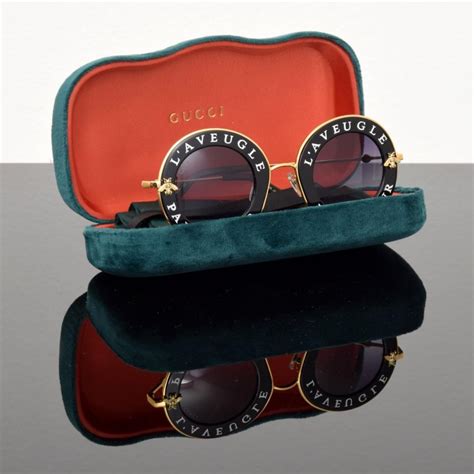 aveugle par amour gucci sunglasses|love is blind gucci motto.